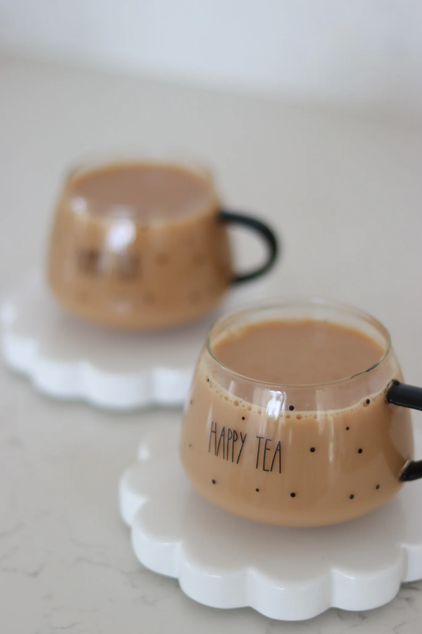 Set Of 2 Short Glass Mugs - Black Handled/Happy Tea